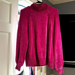 Left sweater size large